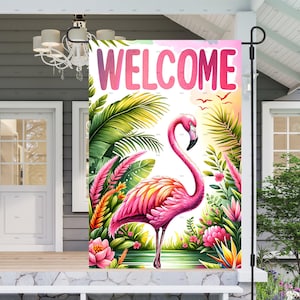 May include: A pink flamingo with a tropical floral background and the word "WELCOME" in pink letters. This is a garden flag.