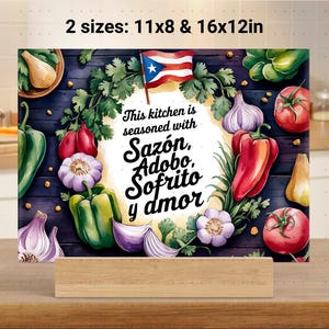 May include: A watercolor kitchen cutting board with a Puerto Rican flag and the text "This kitchen is seasoned with Sazón, Adobo, Sofrito y amor". The board is decorated with colorful vegetables and herbs.