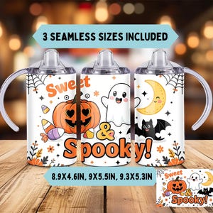 May include: Three white sippy cups with handles, each decorated with Halloween designs. The cups feature a pumpkin, a ghost, and a bat with a crescent moon. The text "Sweet & Spooky!" is displayed on the cups.