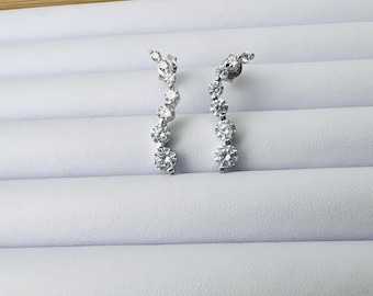 Sterling Silver Journey Earrings: Graduated CZ Wave Drop