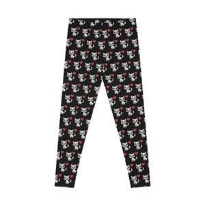 May include: Black leggings with a white cat and red heart pattern.