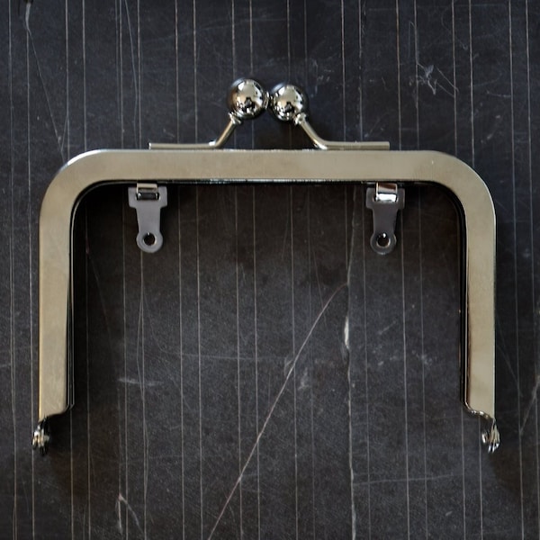 4.5" inch silver purse frame, glue in, kisslock closure, drop-down loops, 11.5cm
