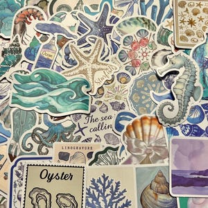May include: A collection of colorful stickers featuring various ocean-themed illustrations, including a starfish, an octopus, a seashell, a seahorse, and a wave. The stickers are printed on white paper and have a glossy finish.