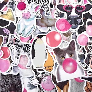 May include: A collection of colorful animal stickers, including a zebra, penguin, cat, and pug, each blowing a pink bubble. The stickers have a white border and are arranged in a random pattern.