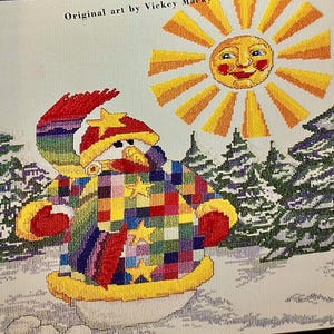 May include: A colorful patchwork snowman with a star on its hat stands in a snowy landscape with a yellow sun shining in the sky.  Original art by Vicky Mack.