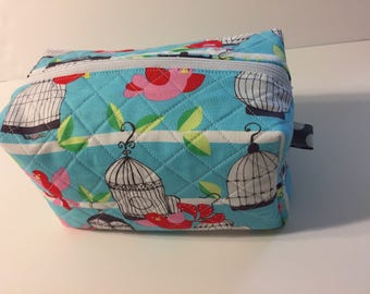 Aqua toiletry zippered bag with red birds quilted and lined cotton fabrics