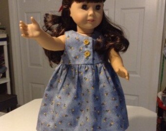 Dress or Jumper with small yellow flowers on a blue background for American Girl Doll or similar size doll