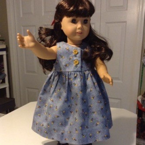 Dress or Jumper with small yellow flowers on a blue background for American Girl Doll or similar size doll