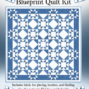 May include: A blue and white quilt kit with the text "Something Blue, Blueprint Quilt Kit." The quilt design features star and diamond patterns. The kit includes fabric for piecing, borders, and binding, plus the pattern. The finished quilt measures 74" by 74".