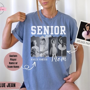 May include: Blue jean t-shirt with the word "SENIOR" above the year "2026" and the word "Mom". The shirt features a photo and the name "SALLY SMITH". A photo of a ballerina is on the right. The shirt has the text "Custom Player Name or Team Name".