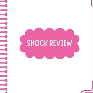 May include: A white notebook with a pink spiral binding on the left side. The cover features a pink cloud-shaped design with the words "SHOCK REVIEW" in white. Decorative pink swirls are in the upper right corner.