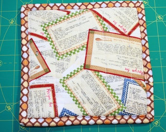Quilted pot holder. reversable