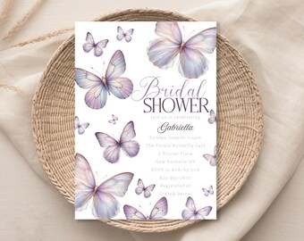 May include: A purple and white butterfly themed bridal shower invitation with the text "Bridal Shower" and "Gabriella". The invitation includes the date, time, location, and RSVP information.