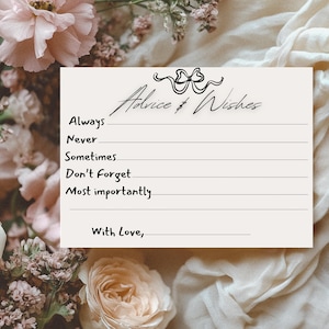 May include: A white card with black text that reads "Advice & Wishes". The card has lines for writing and says "Always", "Never", "Sometimes", "Don't Forget", "Most Importantly", and "With Love" at the top.