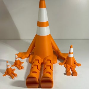 Traffic cone buddy figurine 3d printed desk toy articulated legs.