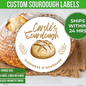 May include: White round sticker with the text "Carole's Sourdough" in gold script. The sticker also features a drawing of a loaf of sourdough bread and the text "Happiness is Homemade".