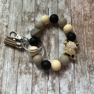 Pulsera de pulsera con llavero de cuentas de silicona de vaca de las tierras altas occidentales