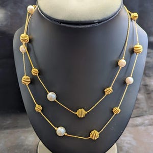 Long Gold-tone Station Necklace