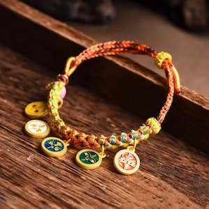 Handmade Lucky Charm Bracelet – Woven Multicolor Cord with Enamel Gold Charms | Adjustable Boho Spiritual Jewelry | Good Luck Gift