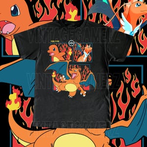 May include: Black t-shirt with a graphic of three fire-type Pokémon characters. The design includes the text "FIRE TYPE" and "VINTAGEGAMERZ". The artwork uses orange and blue colours, with flames in the background.