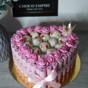 Boîte de chocolats Riegels remplis de roses Raphaël et de roses artificielles ! Joli cadeau pour les enfants, la famille et votre moitié !