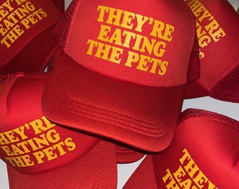 Se están comiendo a las mascotas - Gorra de camionero