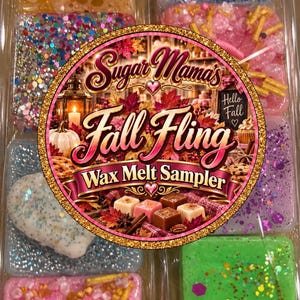 May include: A clear plastic tray containing eight rectangular wax melts in various colours including yellow, blue, pink, purple, white, and green. The melts are decorated with glitter and sprinkles. A circular label reads Sugar Mama's Fall Fling Wax Melt Sampler.