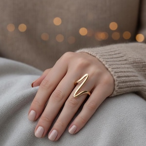 Handgemaakte sterlingzilveren abstracte golfring: geometrische oceaansieraden