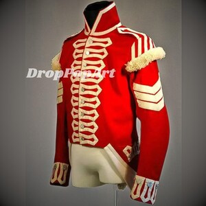 May include: A red jacket with white trim and a white fur collar. The jacket has a high collar and a long, pointed tail. The jacket is decorated with white buttons and white piping.