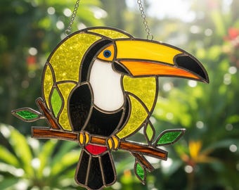 Modello di vetrata con tucano • Modello di acchiappasole con uccello numerato