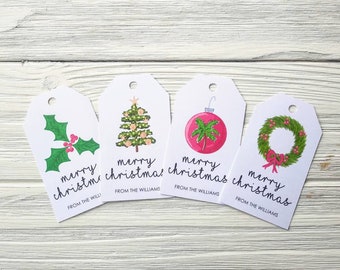 May include: Four white gift tags with different Christmas illustrations and the text "merry christmas" and "from the williams". The illustrations include a holly sprig, a Christmas tree, a pink ornament with a palm tree, and a green wreath with a red bow.