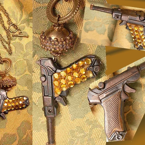 Dangerous Woman rhinestone jeweled gun necklace