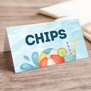 May include: A folded card with the word "CHIPS" in dark blue letters. The card features a watercolor illustration of a beach ball, a drink with a straw, and water splashes against a light blue background.