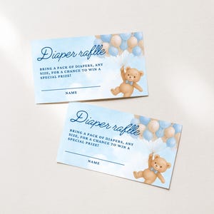 May include: Two baby shower diaper raffle tickets. Each ticket has a light blue background with a teddy bear holding balloons. The text reads "Diaper raffle" and "Bring a pack of diapers, any size, for a chance to win a special prize!"