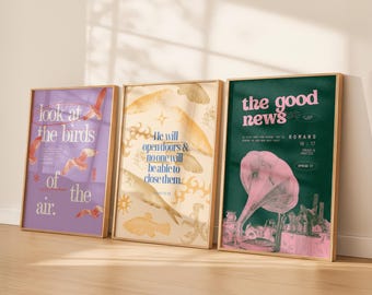 May include: Three framed art prints with gold frames. The prints feature text and illustrations in various colors. One print is purple with birds and text, another is beige with fish and text, and the third is green with a gramophone and text.
