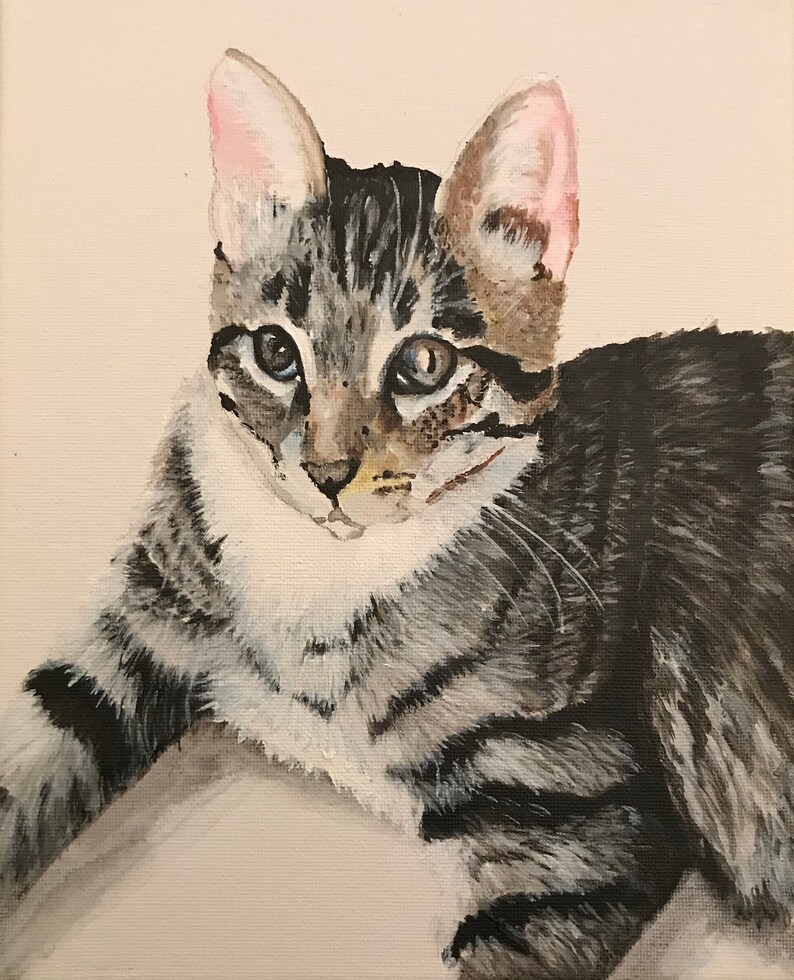 May include: A painting of a tabby cat with gray and black stripes. The cat has a white chest and pink ears. The cat is looking directly at the viewer.