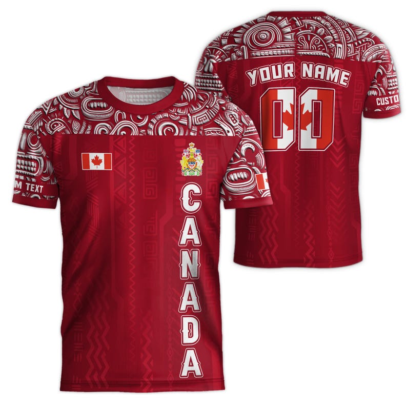 May include: Red and white t-shirt with a Polynesian-inspired design. The shirt features the Canadian flag, the Canadian coat of arms, and the word "CANADA" vertically down the right side. The back of the shirt has a white number "00" and the text "YOUR NAME".