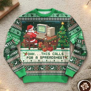 May include: Green Christmas sweater with a festive design. Santa Claus is at a computer with a spreadsheet, a Christmas tree, and the text "OHH...THIS CALLS FOR A SPREADSHEET". The sweater has snowflakes, reindeer, and other holiday elements.