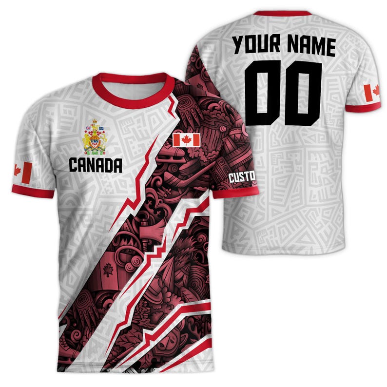 May include: White and red soccer jersey with a Canadian flag and the word "CANADA" on the front. The back of the jersey has a white background with a gray pattern and the text "YOUR NAME 00".