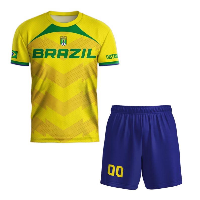 May include: A yellow and green Brazil soccer jersey and blue shorts set. The jersey has the word "BRAZIL" in large green letters across the front. The shorts have the number "00" in yellow. The jersey has a chevron pattern.
