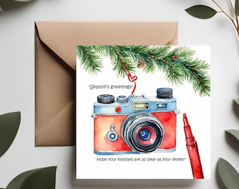 Tarjeta navideña con cámara vintage: saludos navideños para fotógrafos