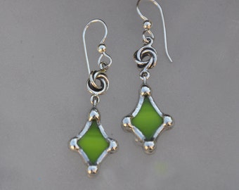 Avacado green curved diamond earrings