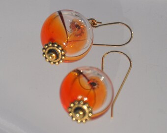 Clear and red swirl blown glass globe earrings