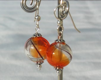 Red and clear glass ball earrings