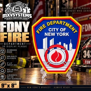 May include: A 9-inch by 8-inch 3D display plaque featuring the Fire Department City of New York emblem. The shield-shaped plaque displays a blue and white skyline, a red flame icon, and the text Fire Department City of New York in yellow.