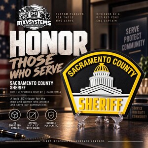 May include: A 3D plaque for the Sacramento County Sheriff featuring a black shield shape with a yellow border. The center displays a white building with a yellow dome and the text SACRAMENTO COUNTY SHERIFF. It measures approximately 9.5 by 7.5 inches.