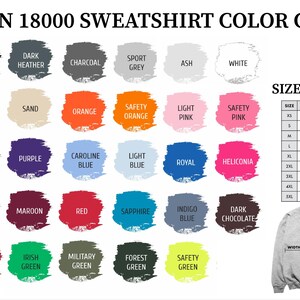 May include: Color chart for Gildan 18000 sweatshirts, featuring a range of colors from black to white, with shades of gold, orange, and blue. Includes a size chart with width and length measurements in inches.