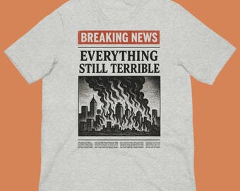 Ultime notizie: Tutto è ancora terribile - Maglietta unisex con commento sociale