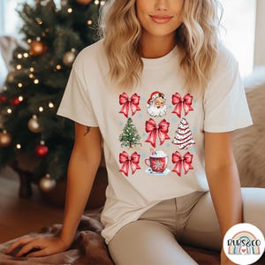 Camiseta con lazos navideños para mujer