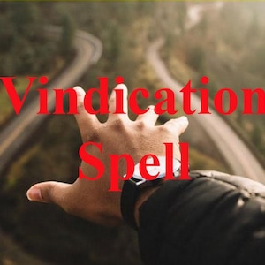 May include: A hand reaches out towards a winding road in a forest setting. The text "Vindication Spell" is superimposed over the image.